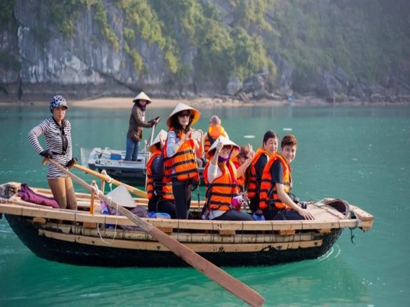 Bamboo boat ride at Tung Sau Pearl Farm in Halong Bay