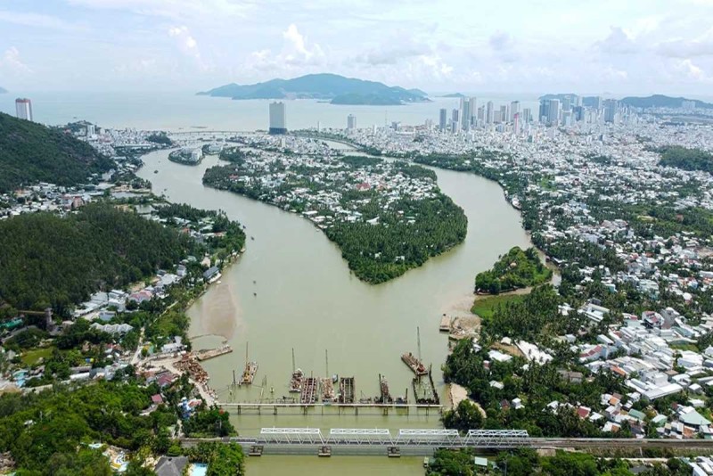 Busy Cai River with Fishing and Tour Boats Busy Cai River scene with numerous fishing and tour boats near Nha Trang harbor