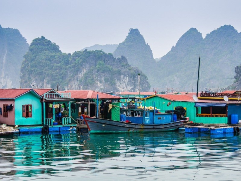 Colorful floating houses of Cua Van village in Halong Bay