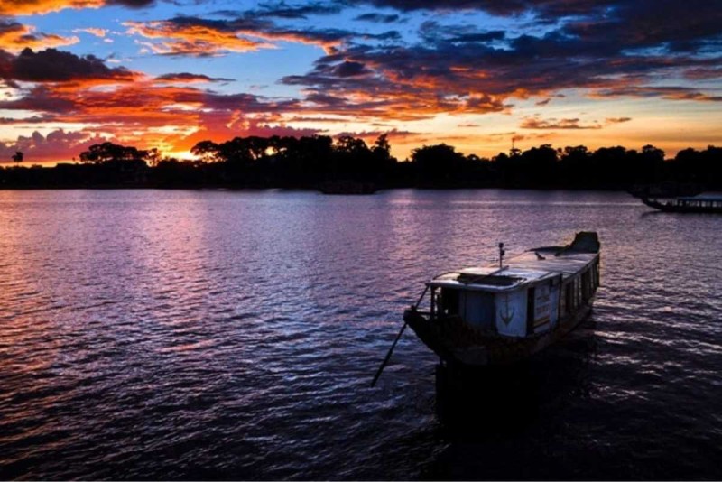 Sunset Over Cai River Nha Trang Swimming Area Sunset sky over Cai River Nha Trang with calm water ideal for swimming and relaxing