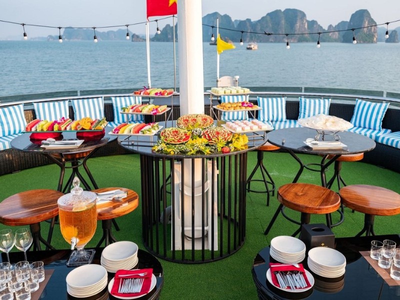Vibrant Deck Sunset Party A vibrant deck party with beautiful Halong scenery
