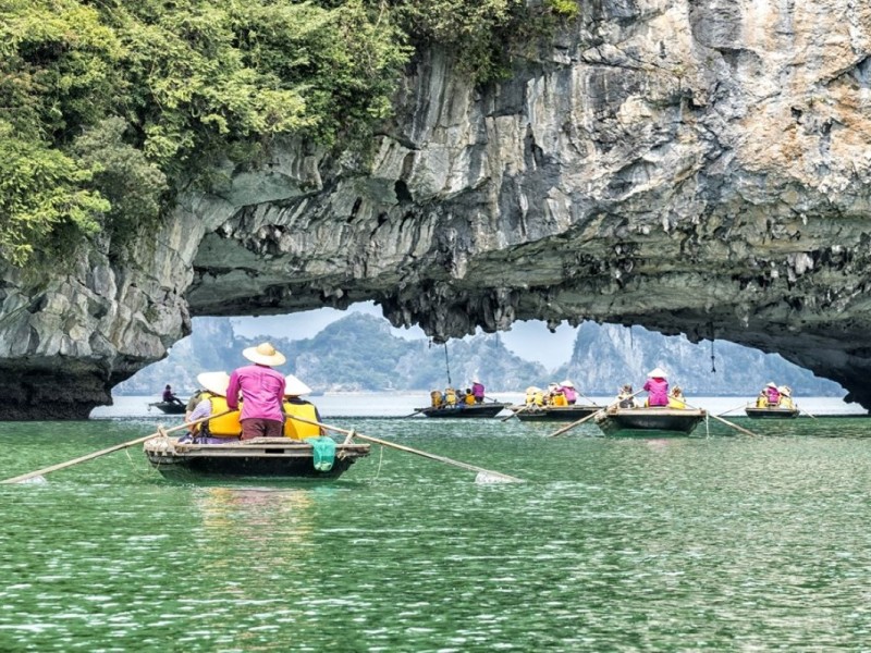 A Scenic View from Hang Trong and Hang Trinh Nu Caves A scenic view from Hang Trong and Hang Trinh Nu Caves in Halong Bay, offering a perfect vantage point.