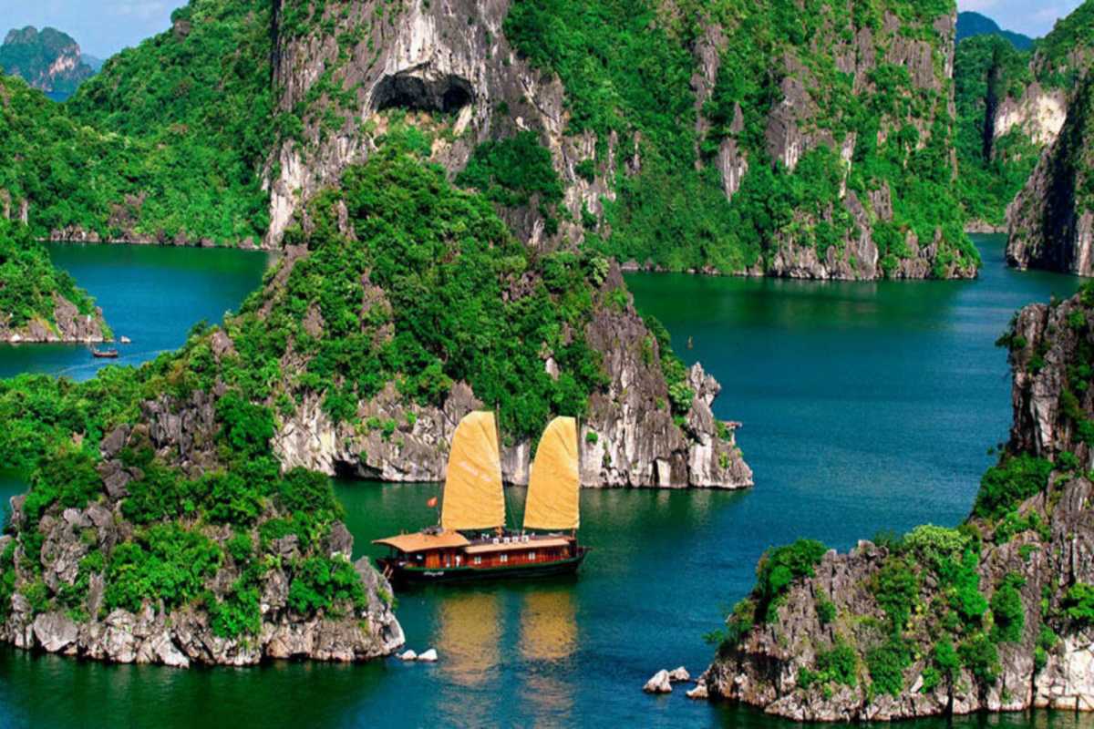Panoramic mountain overlook view of Ba Ham Lake and surrounding limestone karsts in Halong Bay
