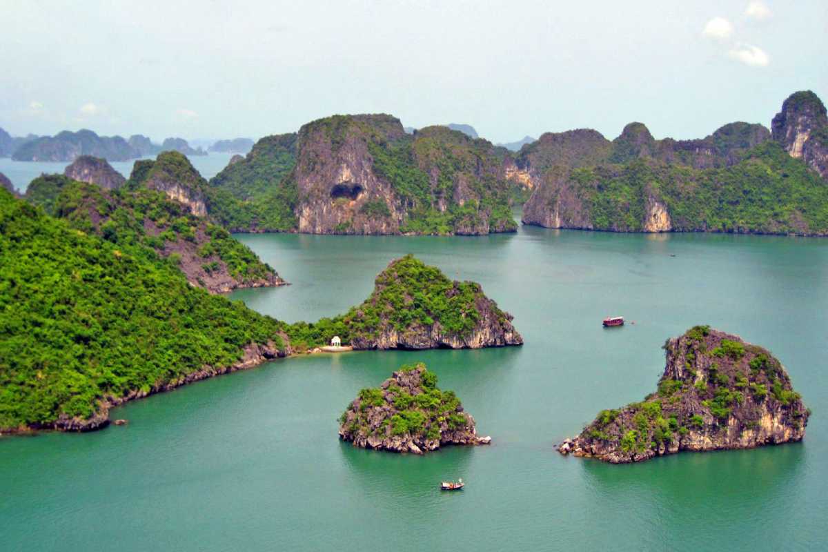 Scenic lookout at Ba Ham Lake Halong Bay offering panoramic views of limestone islands and emerald waters.