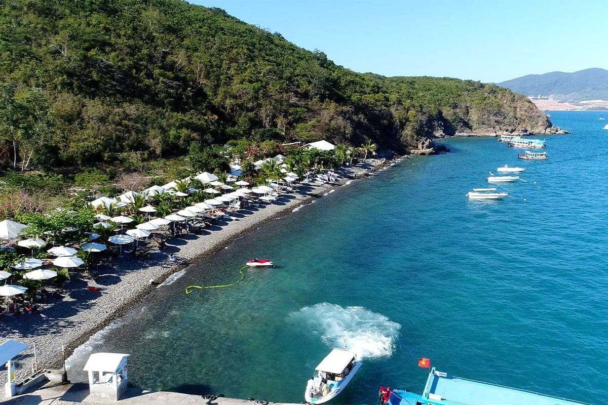 Panoramic coastal view with boats anchored near Bai San Beach, Nha Trang