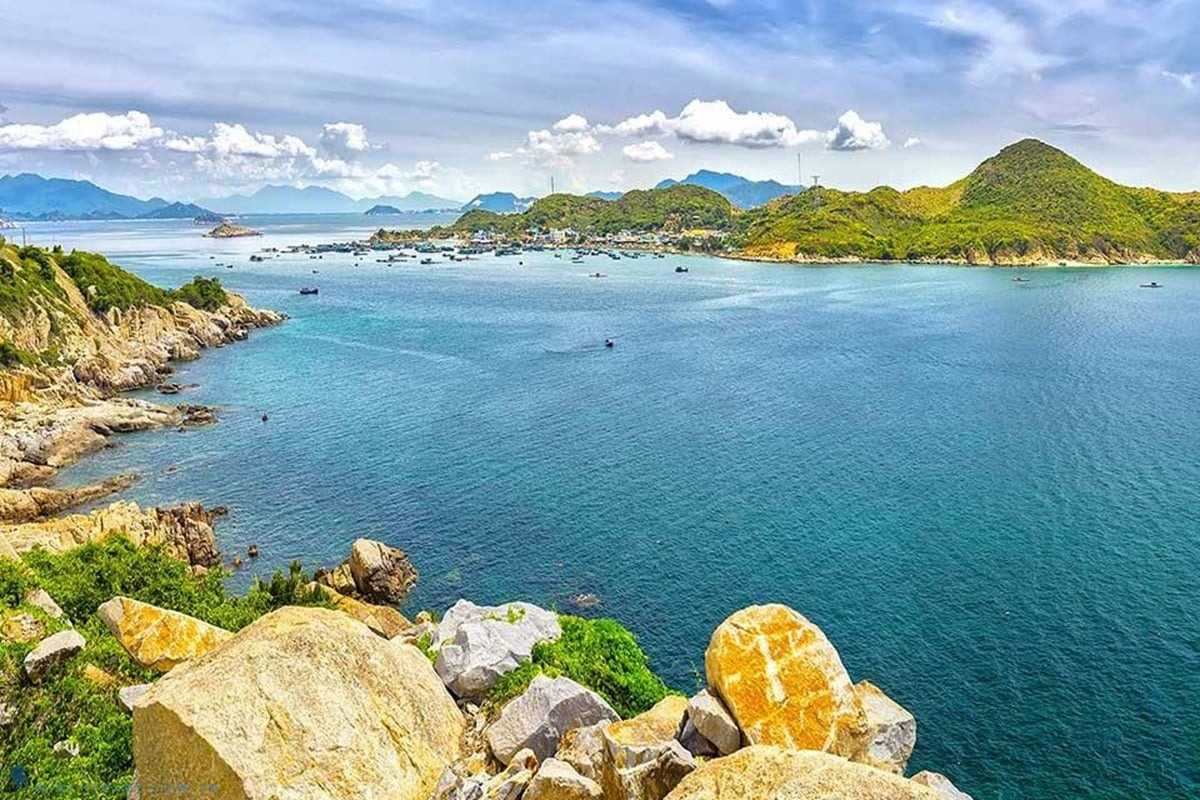 Beachfront bungalows on Thi Island Beachfront thatched bungalows nestled among trees on Thi Island Nha Trang