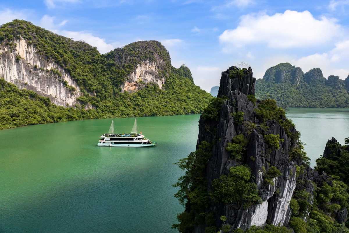 Bo Nau Cave Halong Bay stunning limestone formations and calm waters visible from the cave’s entrance.