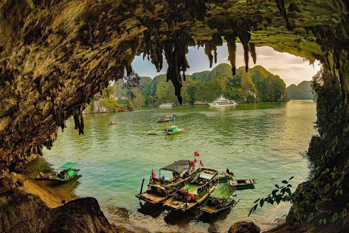 The view from Bo Nau Cave Halong Bay reveals tranquil, emerald waters framed by towering limestone peaks.