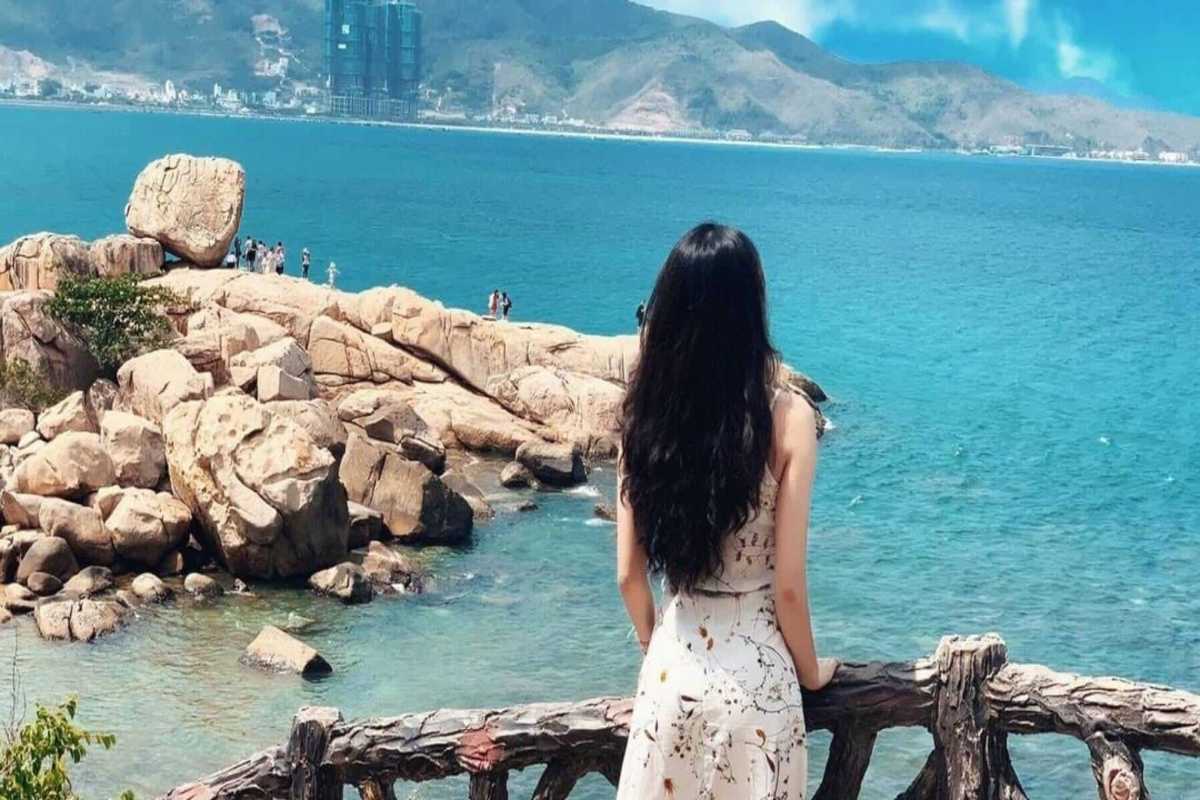 View of Da Chong Wharf with granite rock formations and ocean coastline in Nha Trang
