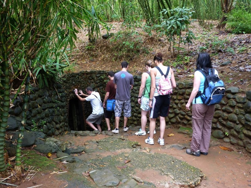 Entering Cu Chi Tunnels Group preparing to enter a Cu Chi Tunnel entrance
