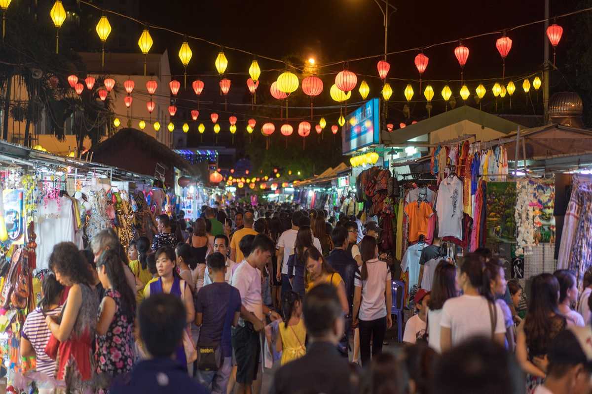Festival Entrance to Nha Trang Night Market Brightly lit archway entrance to Nha Trang Night Market with performance stage visible