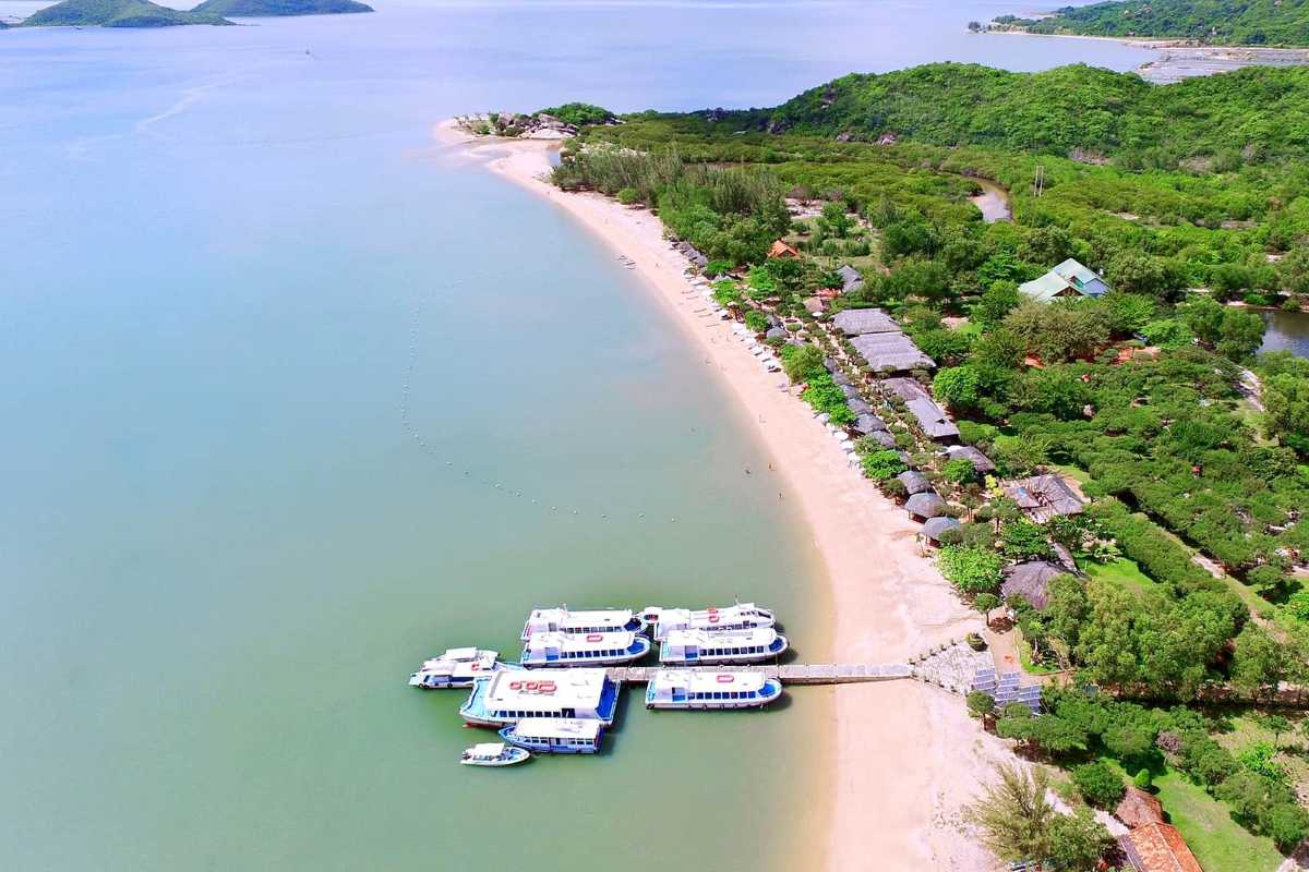 Fishermen and Fishing Boats at Nha Phu Lagoon Nha Trang Local fishermen with fishing boats on calm waters at Nha Phu Lagoon Nha Trang