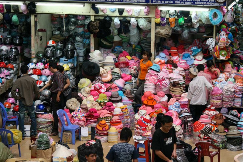 Hat Stalls at Dong Xuan Market A variety of colorful hats on sale at Dong Xuan Market in Hanoi, Vietnam