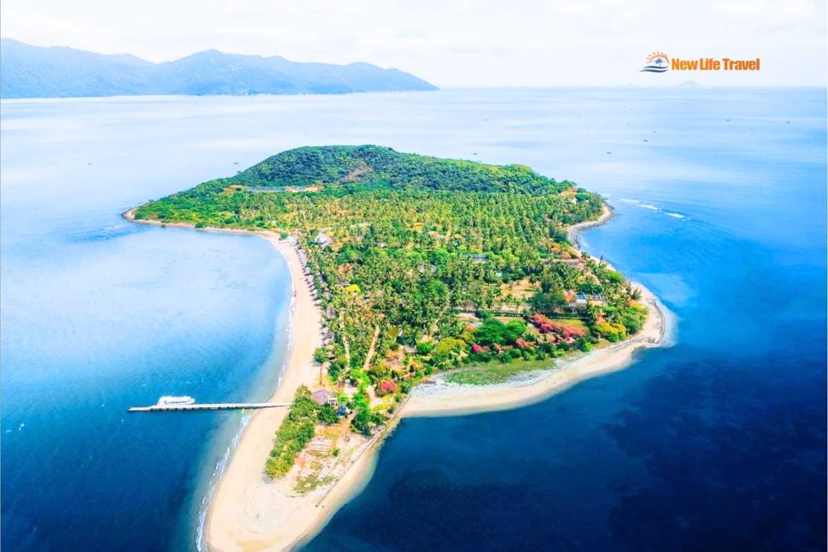 Hon Lao Island Beachfront Sandy beachfront and coconut trees on Hon Lao Island with turquoise sea waters in Nha Trang