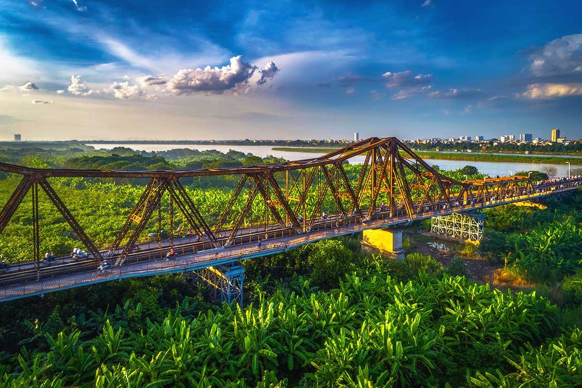 Long Bien Bridge overlooking the lush greenery of Banana Island