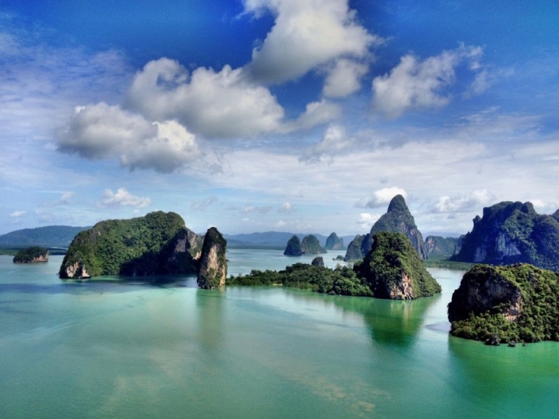 Lan Ha Bay Scenic Overview A panoramic view of Lan Ha Bay with scattered limestone islands rising from the clear blue waters.