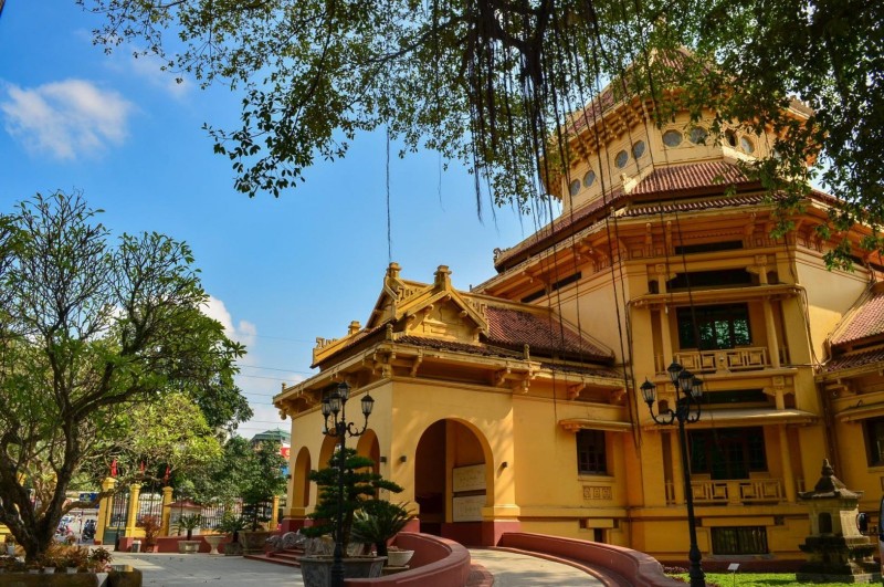 National Museum of Vietnam in Hanoi French Quarter The entrance of the National Museum in the French Quarter of Hanoi, showcasing its colonial architecture and serene surroundings.