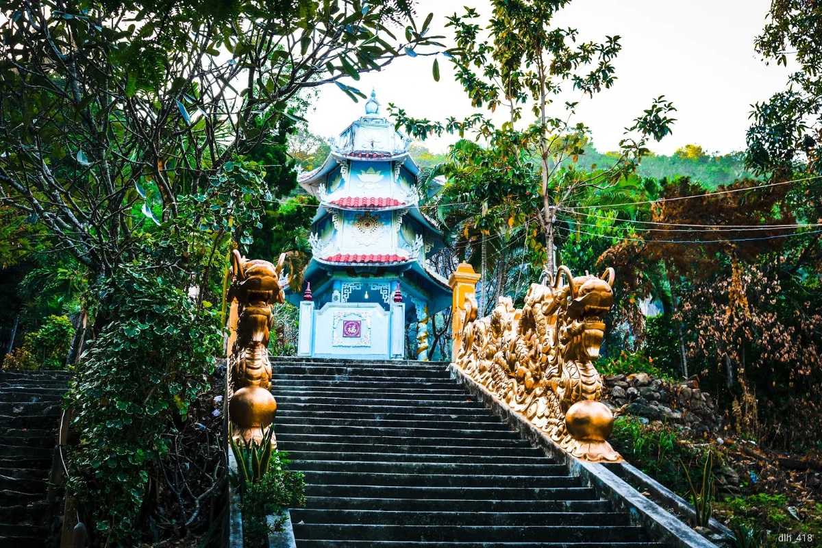 Stone steps leading to Suoi Do Pagoda entrance Stone stairway providing access to Suoi Do Pagoda nestled in the green hills of Nha Trang