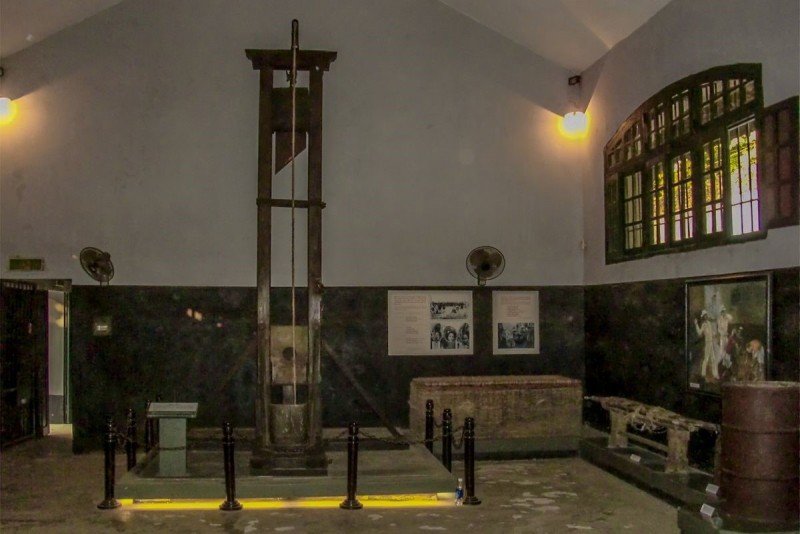 The French Guillotine at Hoa Lo Prison The French guillotine used for executing prisoners at Hoa Lo Prison, a symbol of colonial brutality.