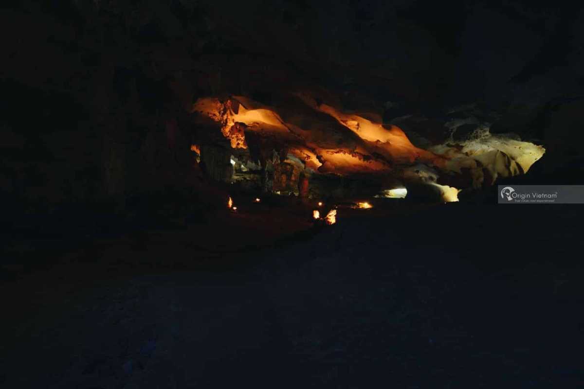 Colorful illuminated rock formations inside Thien Canh Son Cave at Bai Tu Long Bay, Quang Ninh