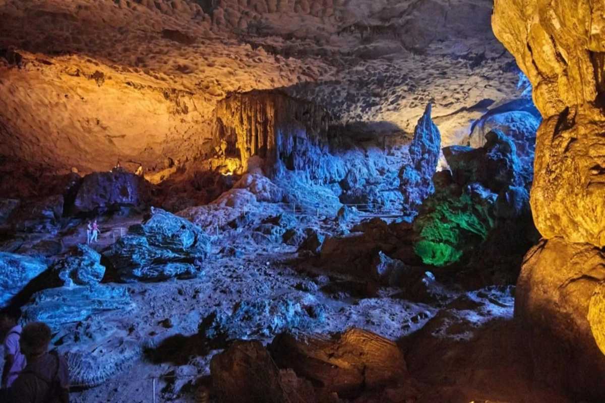 Large rock columns rising inside Thien Canh Son Cave, showcasing natural cave architecture