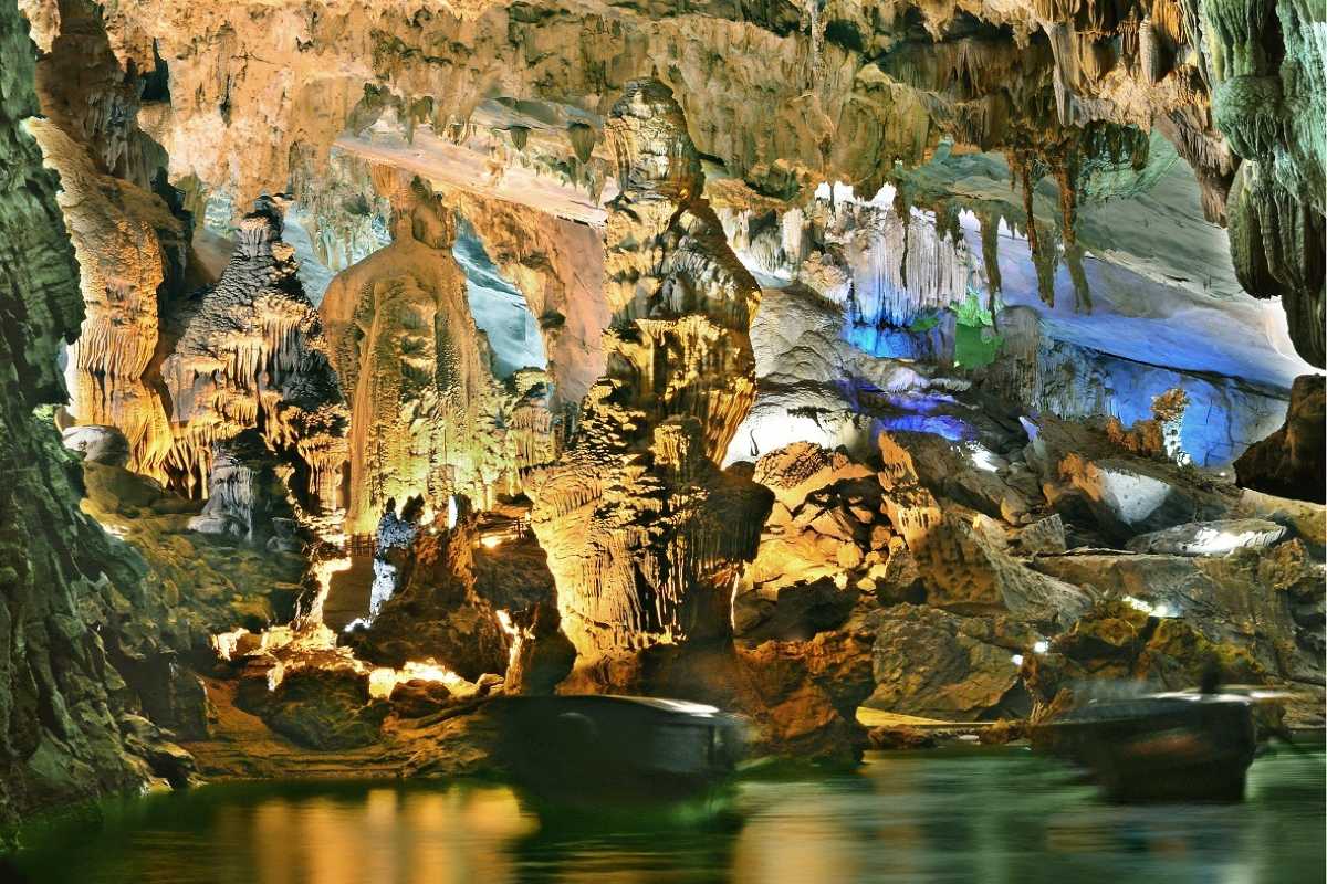Natural stone formations alongside constructed walkways in Thien Canh Son Cave