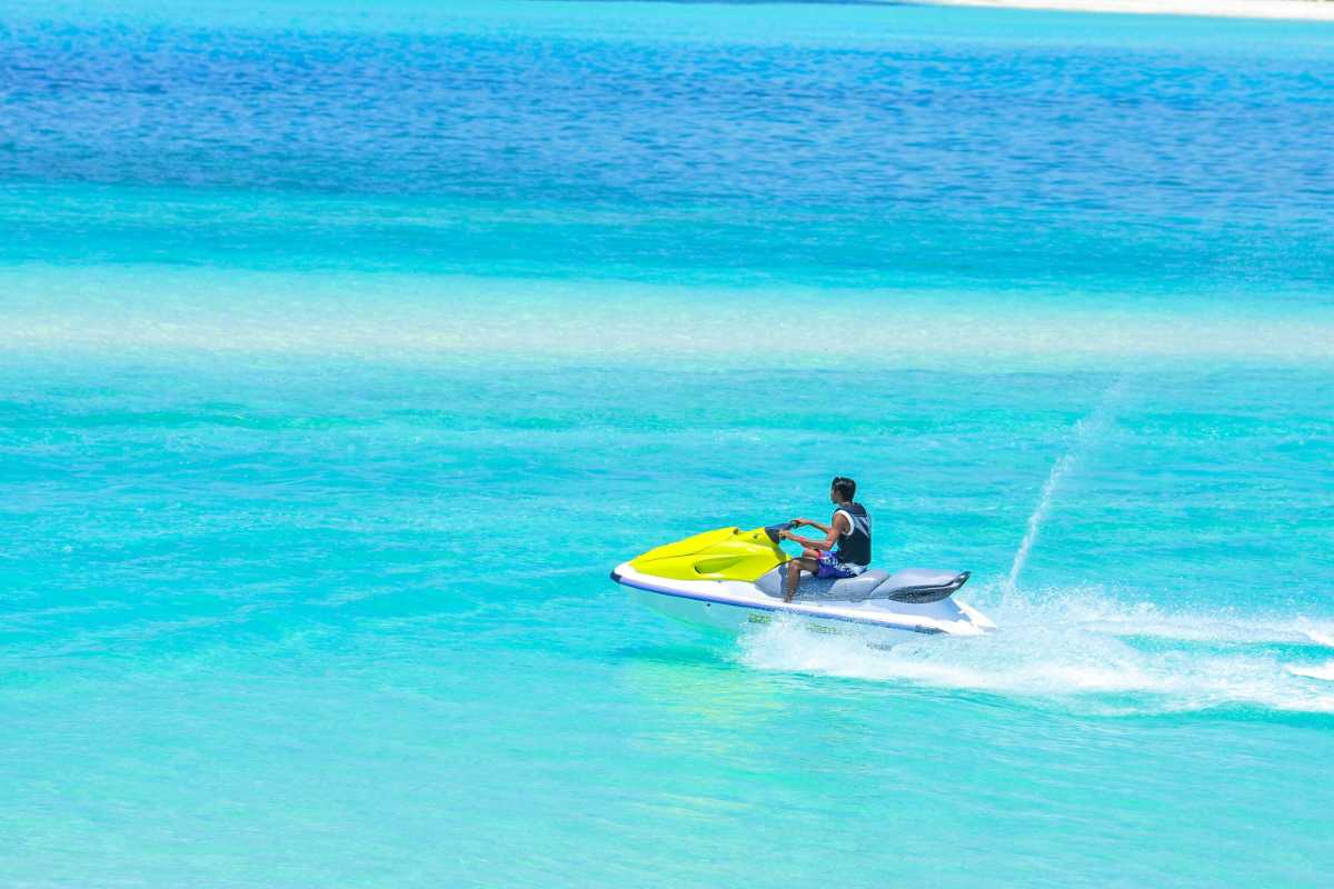 Scenic view of nearby islands from Tien Beach Nha Trang with clear blue sea and sky.