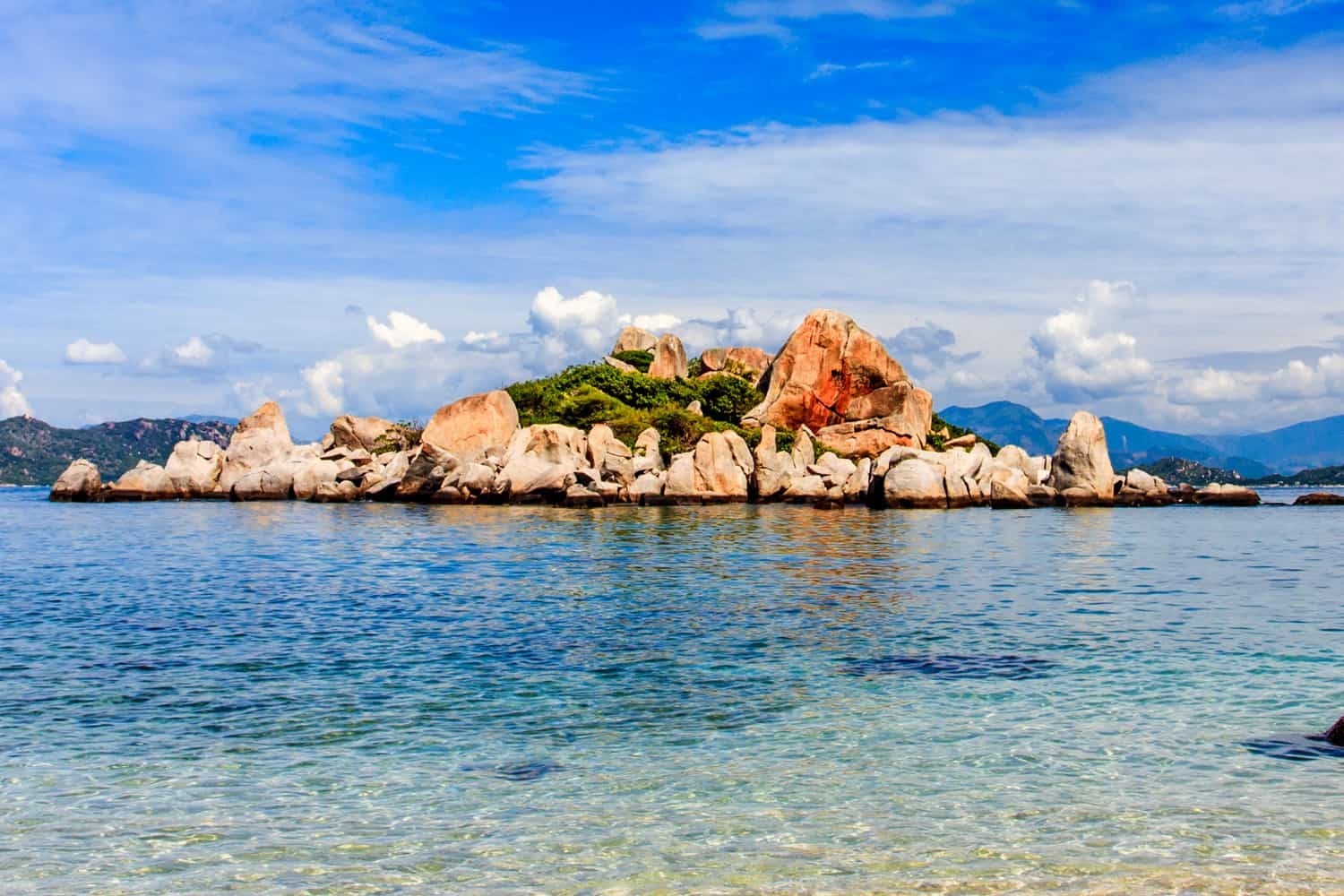 Traditional boat moored at beach on Hon Noi Islands Traditional Vietnamese boat moored at sandy beach of Hon Noi Islands in Nha Trang