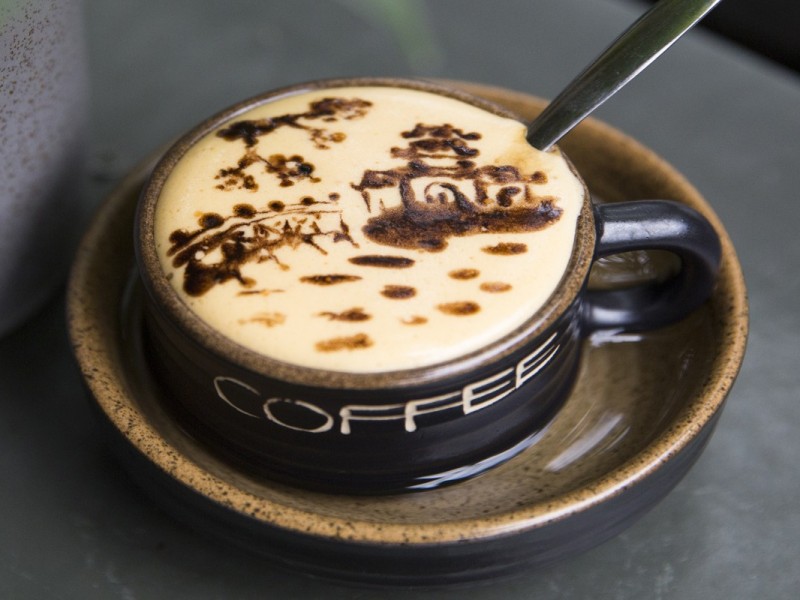 Traditional Vietnamese Egg Coffee Traditional Vietnamese egg coffee in a white cup