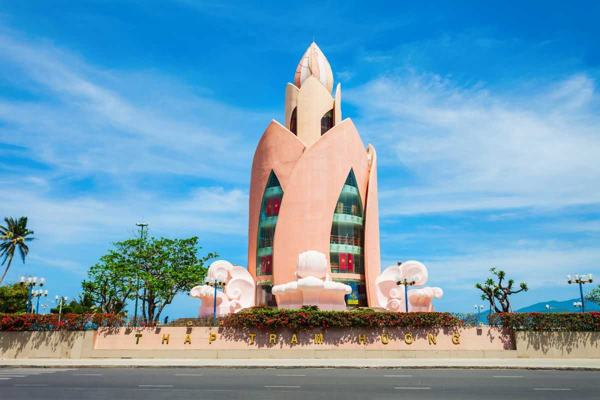 Tram Huong Tower front signage Straight-on view of Tram Huong Tower with its signature sign and blue skies overhead