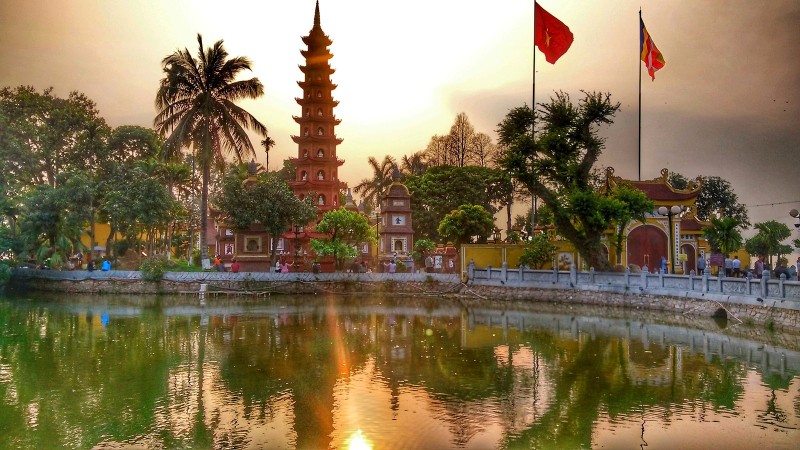 Tran Quoc Pagoda at Sunset Tran Quoc Pagoda in Hanoi during sunset, with a golden hue reflecting on West Lake.