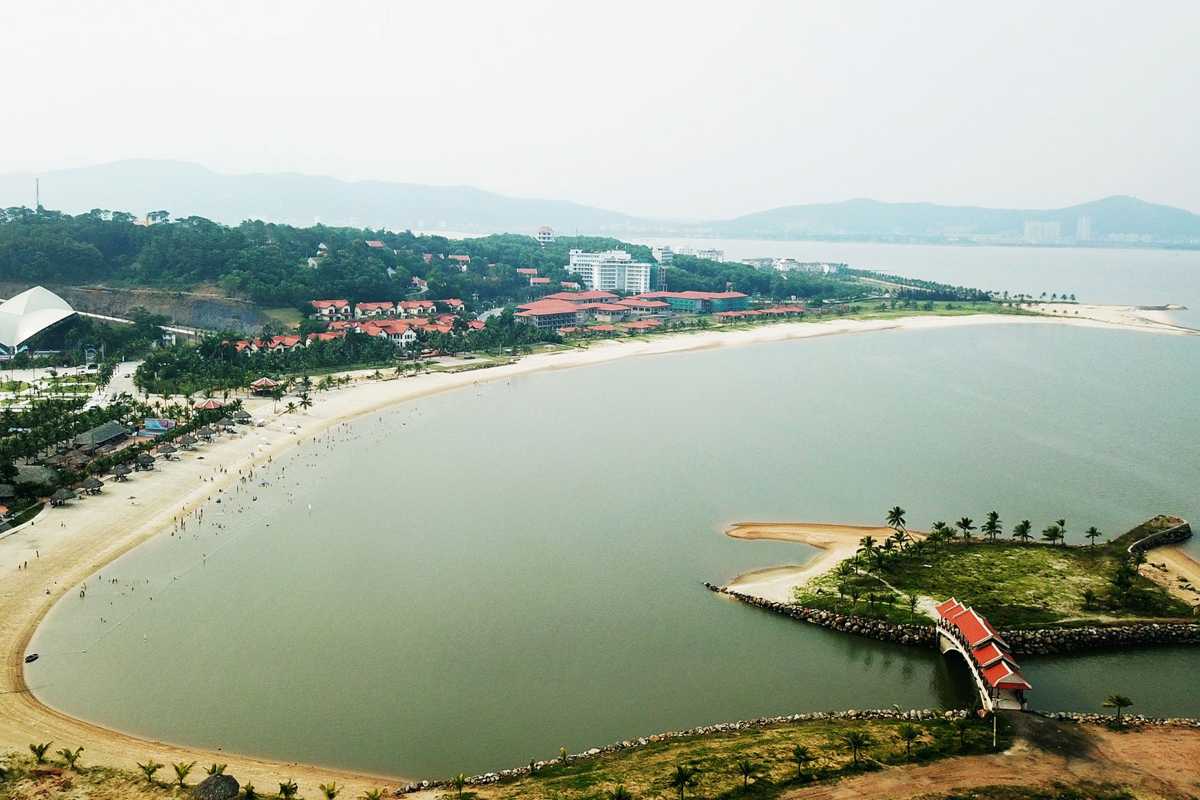 Marina at Tuan Chau Harbor Ha Long Bay with floating homes and boats on calm water
