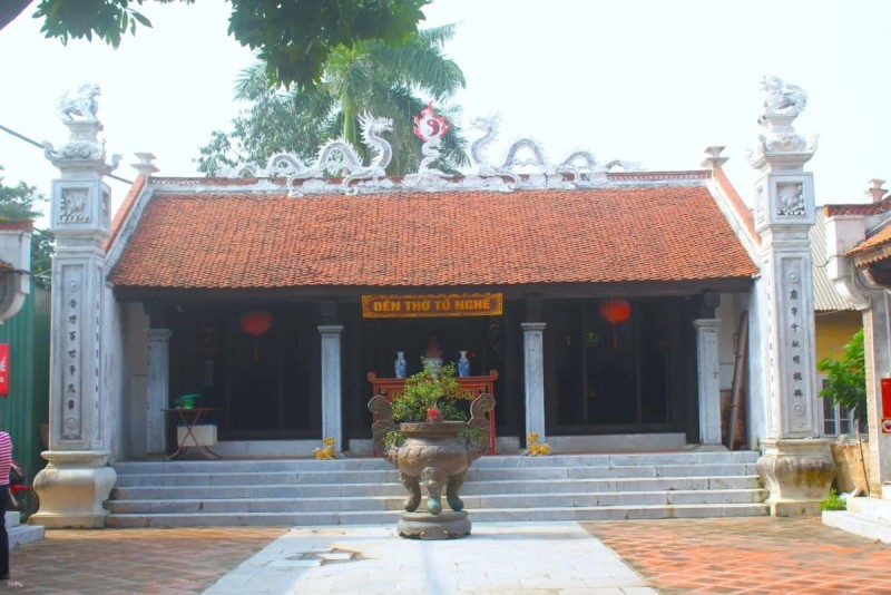 Van Phuc Silk Village Temple Traditional Van Phuc Village Temple with dragon motifs and red tile roof in the silk village.