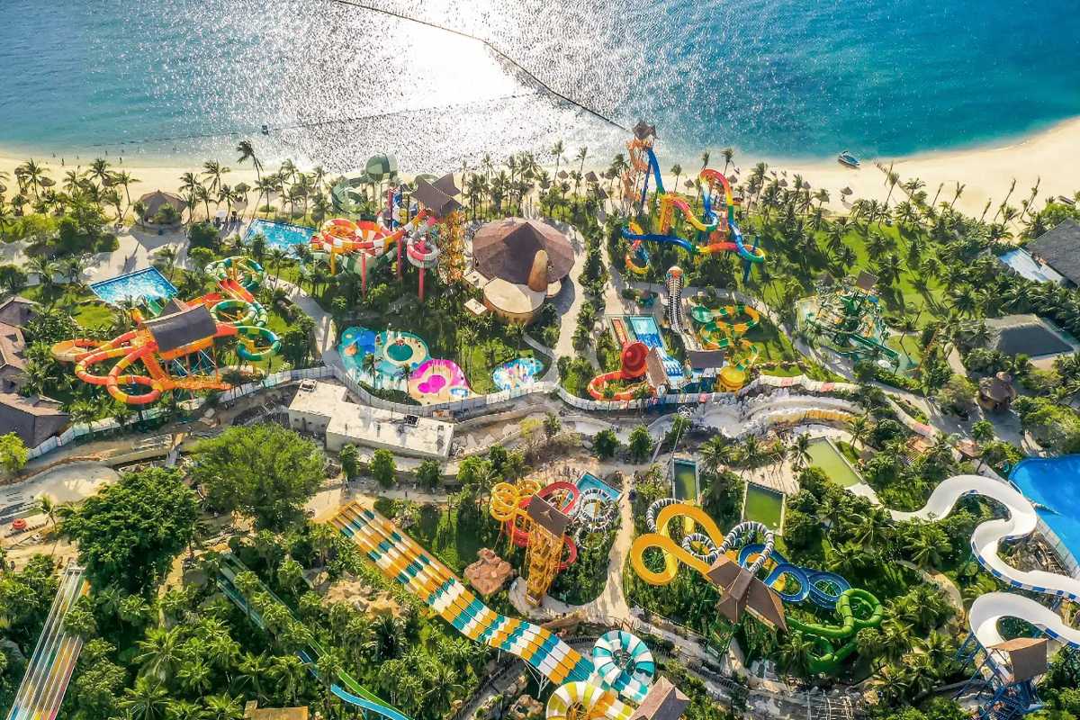 VinWonders Nha Trang Water Park Aerial View Aerial view of the VinWonders Nha Trang water park with colorful slides and beach background