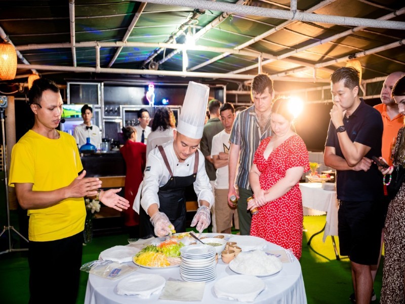 Chef teaching cooking skills on Crown Legend Cruise deck