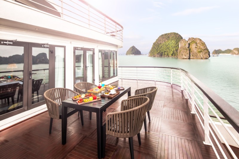 Luxurious bathroom in the Presidential Suite featuring a soaking tub with views of Halong Bay
