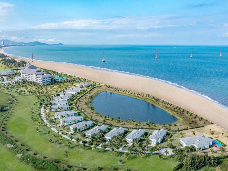 Aerial View of Lan Chau Island - Gem of Cua Lo Beach Lan Chau Island, located near Cua Lo Beach, with clear blue waters and pristine sandy shores.