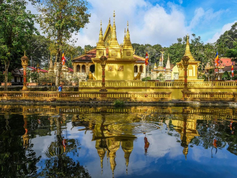 Ang Pagoda in Tra Vinh Reflection in Pond Ang Pagoda in Tra Vinh reflected in a pond, showcasing its Khmer architectural beauty.