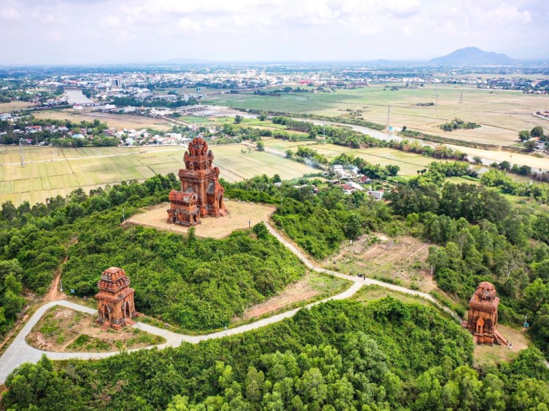 Banh It Towers in Binh Dinh Province Aerial view of the ancient Banh It Towers in Binh Dinh Province surrounded by lush greenery
