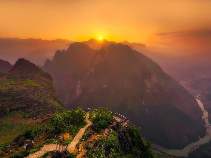Breathtaking Ha Giang Landscape A picturesque landscape in Ha Giang, Vietnam, capturing lush greenery and mountainous terrain.