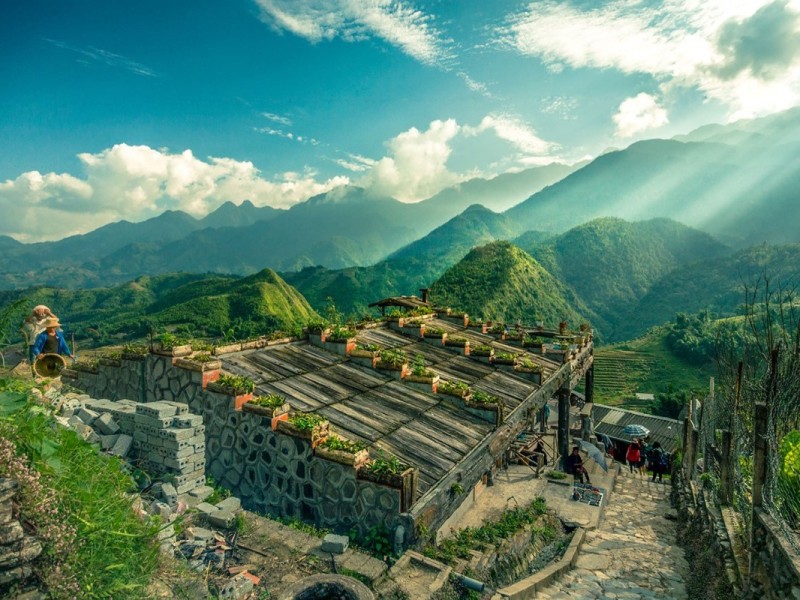 Cat Cat Village with Lush Sa Pa Backdrop Cat Cat Village in Sa Pa with lush green mountains in the background