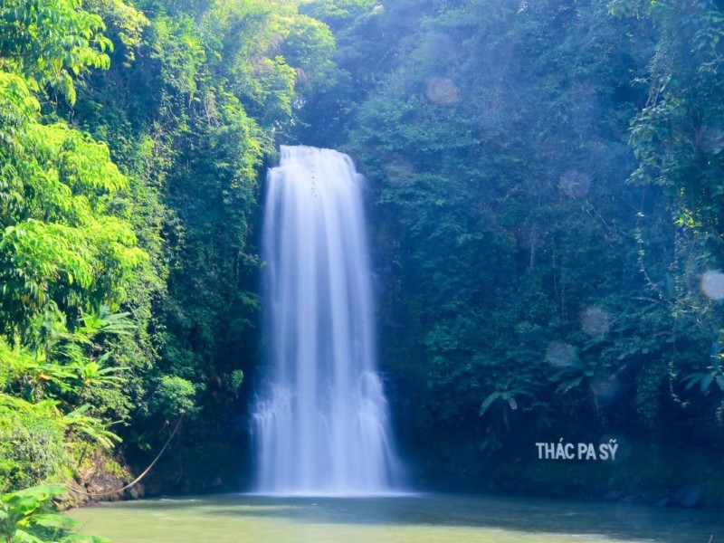 Cultural Event at Pa Sy Waterfall A traditional cultural event taking place near Pa Sy Waterfall in Kon Tum