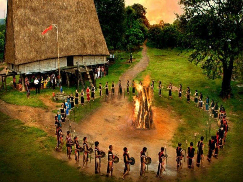 Cultural Gathering at Kon Tum Communal House Cultural gathering around a bonfire at the Kon Tum Communal House in Vietnam