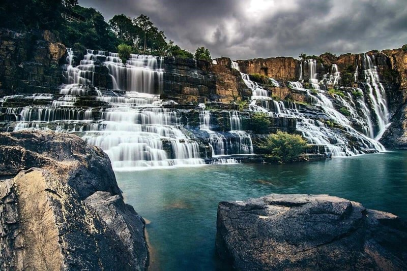 Da Lat Waterfall: Majestic Beauty in Vietnam Majestic waterfall in Da Lat, Vietnam with cascading water and scenic rock formations