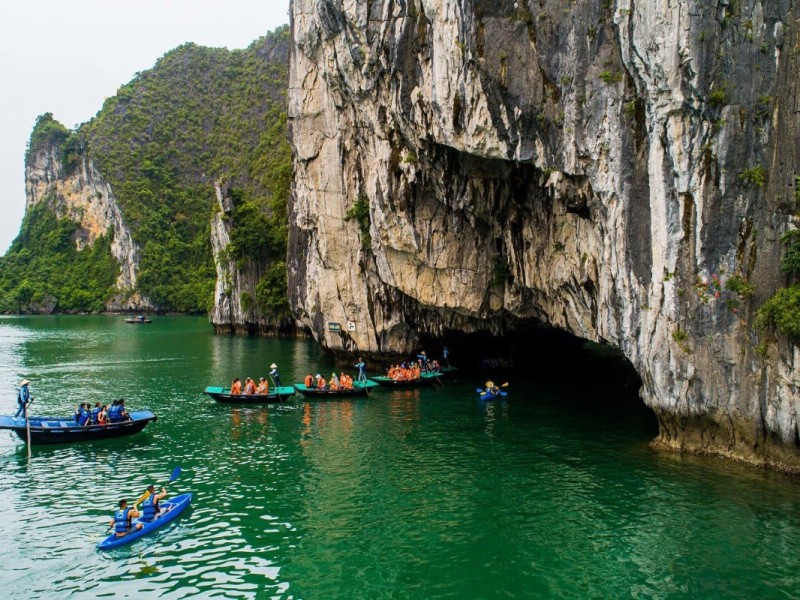 Exploring Luon Cave by Kayak in Lan Ha Bay Kayakers exploring Luon Cave in Lan Ha Bay