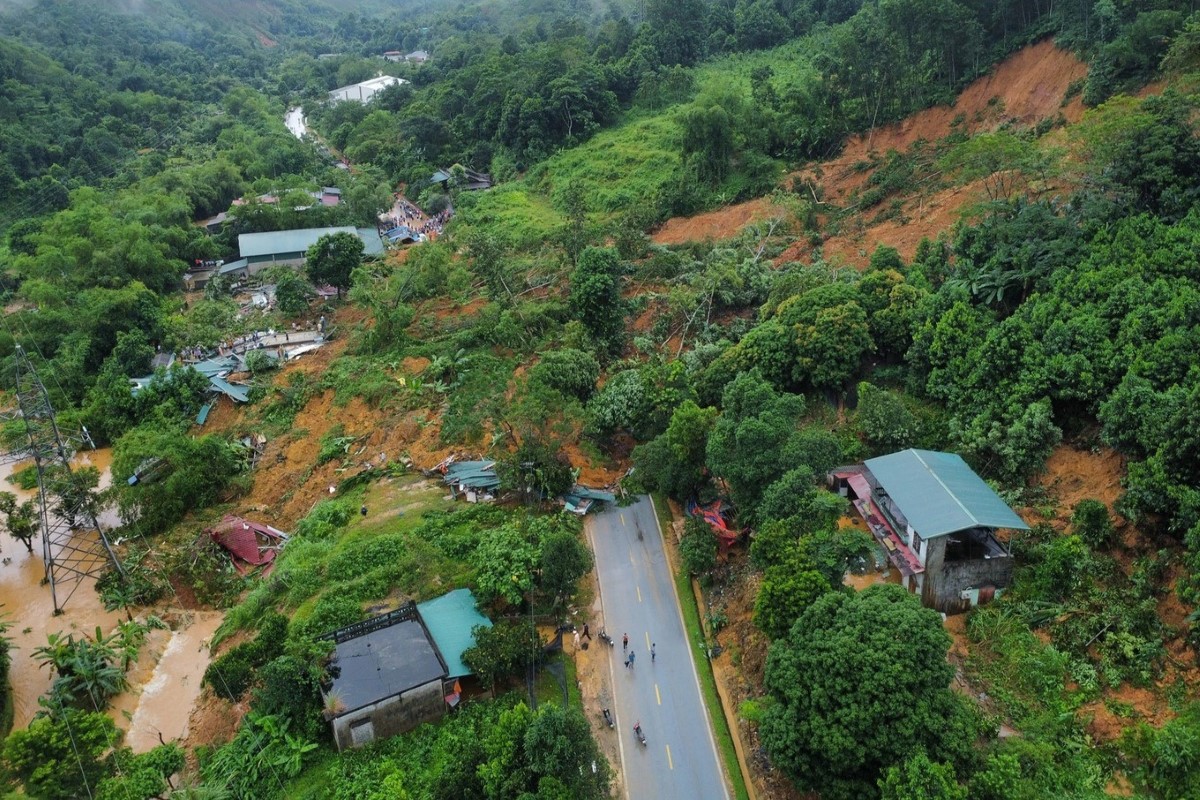 Aerial view of a landslide area in Ha Giang Province, Vietnam, highlighting the aftermath of a natural disaster in the scenic landscape.