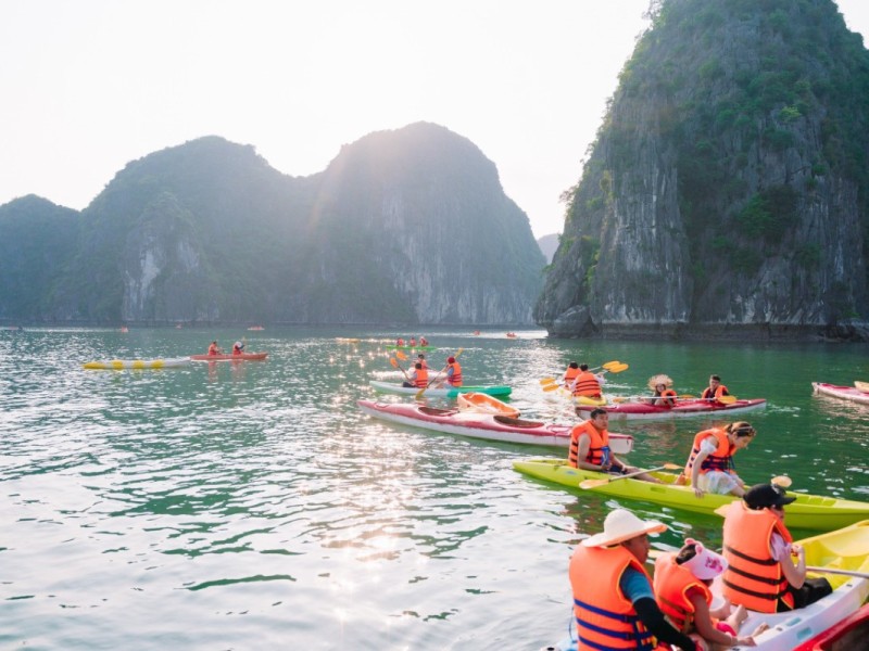 Kayaking Adventure in Lan Ha Bay People kayaking in the scenic waters of Lan Ha Bay