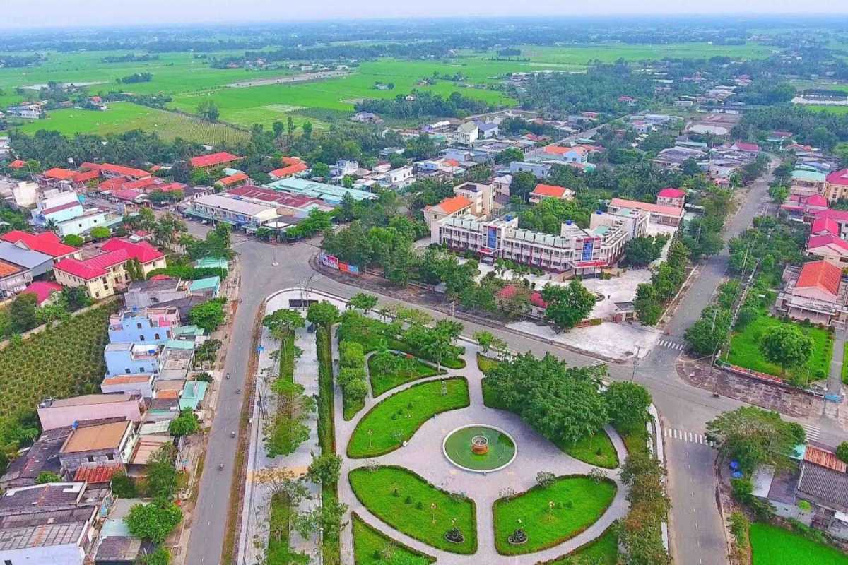Long An Travel Guide aerial view of Tan An City center Aerial view of Long An Travel Guide showing Tan An City center with green parks, roads, and buildings in Mekong Delta