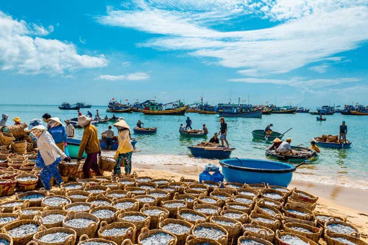 Mui Ne Fishing Village in Binh Thuan Province Fishing boats and fishermen at Mui Ne Fishing Village in Binh Thuan Province