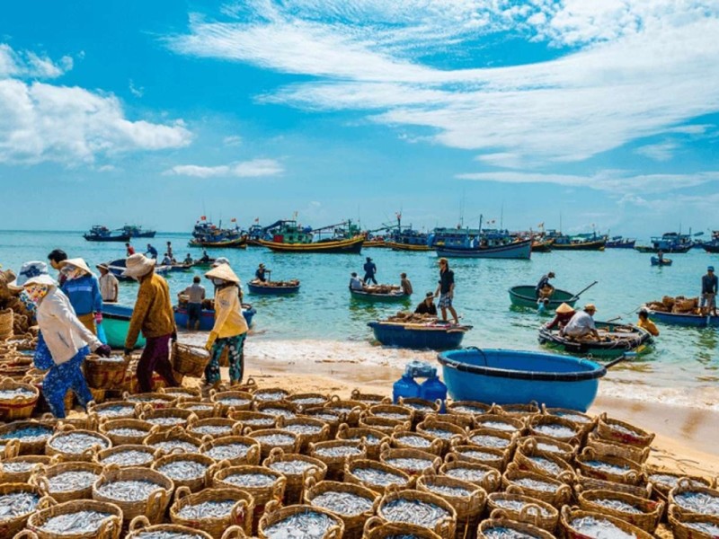 Mui Ne Fishing Village in Binh Thuan Province Fishing boats and fishermen at Mui Ne Fishing Village in Binh Thuan Province